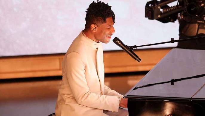 Jon Batiste in total Zegna